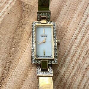 Citizen eco-drive ladies rectangular gold tone solar bracelet watch